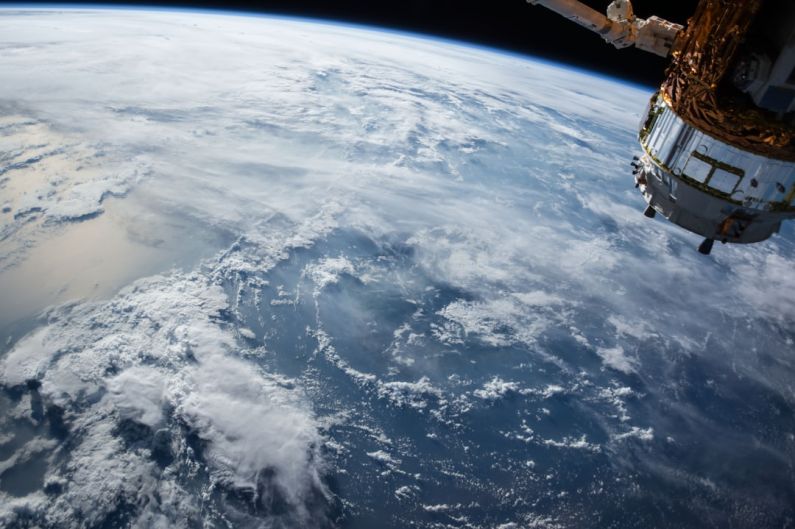 Space - view of Earth and satellite