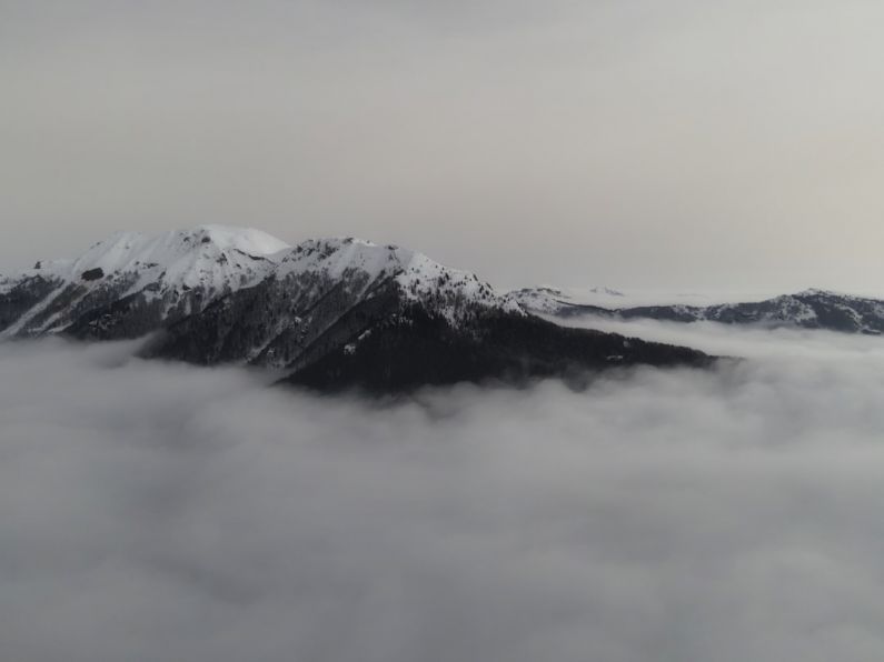 VR - snow covered mountain under white clouds